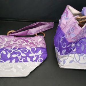 Sac pochon produits maquillage, en satin brodé perles